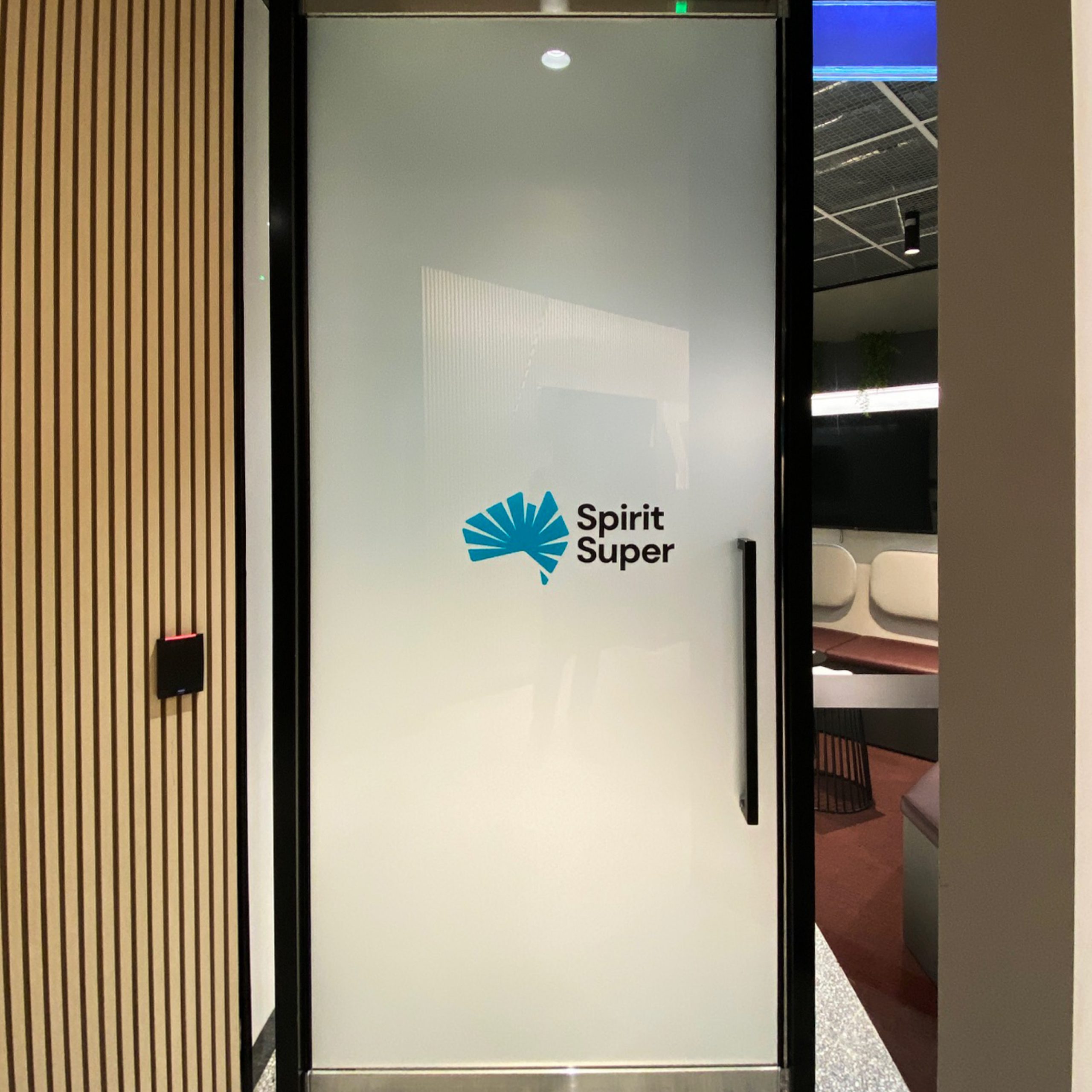 Frosting and vinyl decal installed on the door of the Spirit Super office